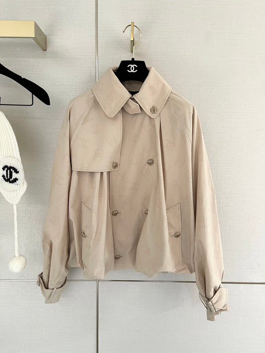 Chan's new short trench coat with subtle logo print