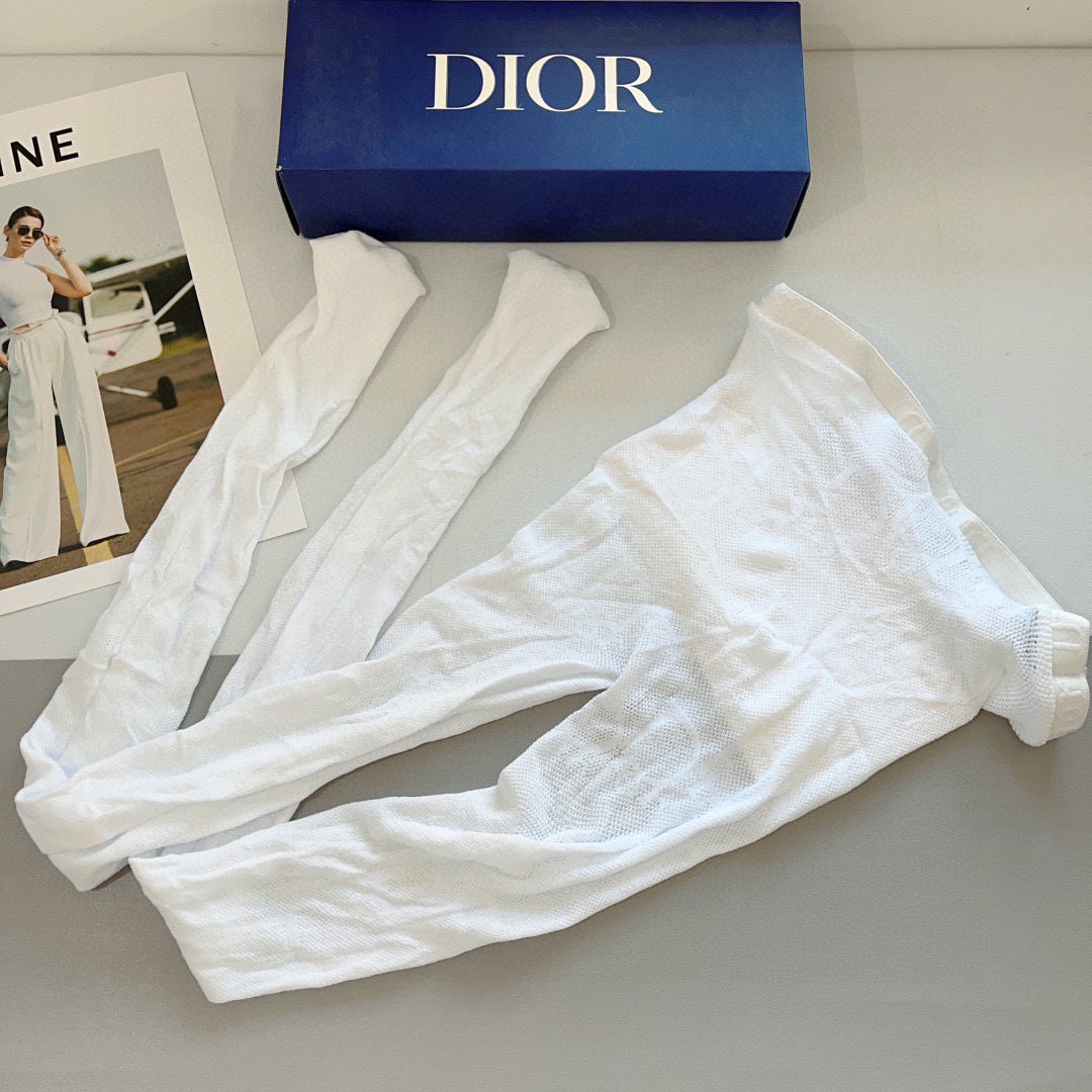 CD fishnet stockings with big D letter