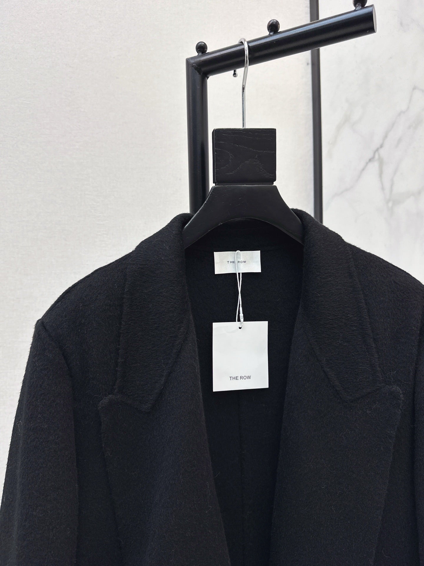 Row NEW woolen overcoats