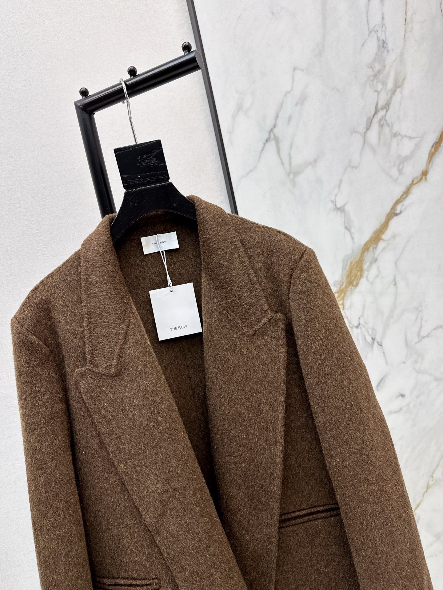 Row NEW woolen overcoats