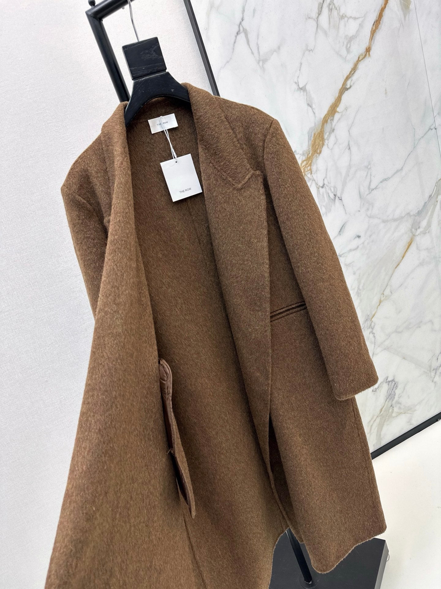 Row NEW woolen overcoats