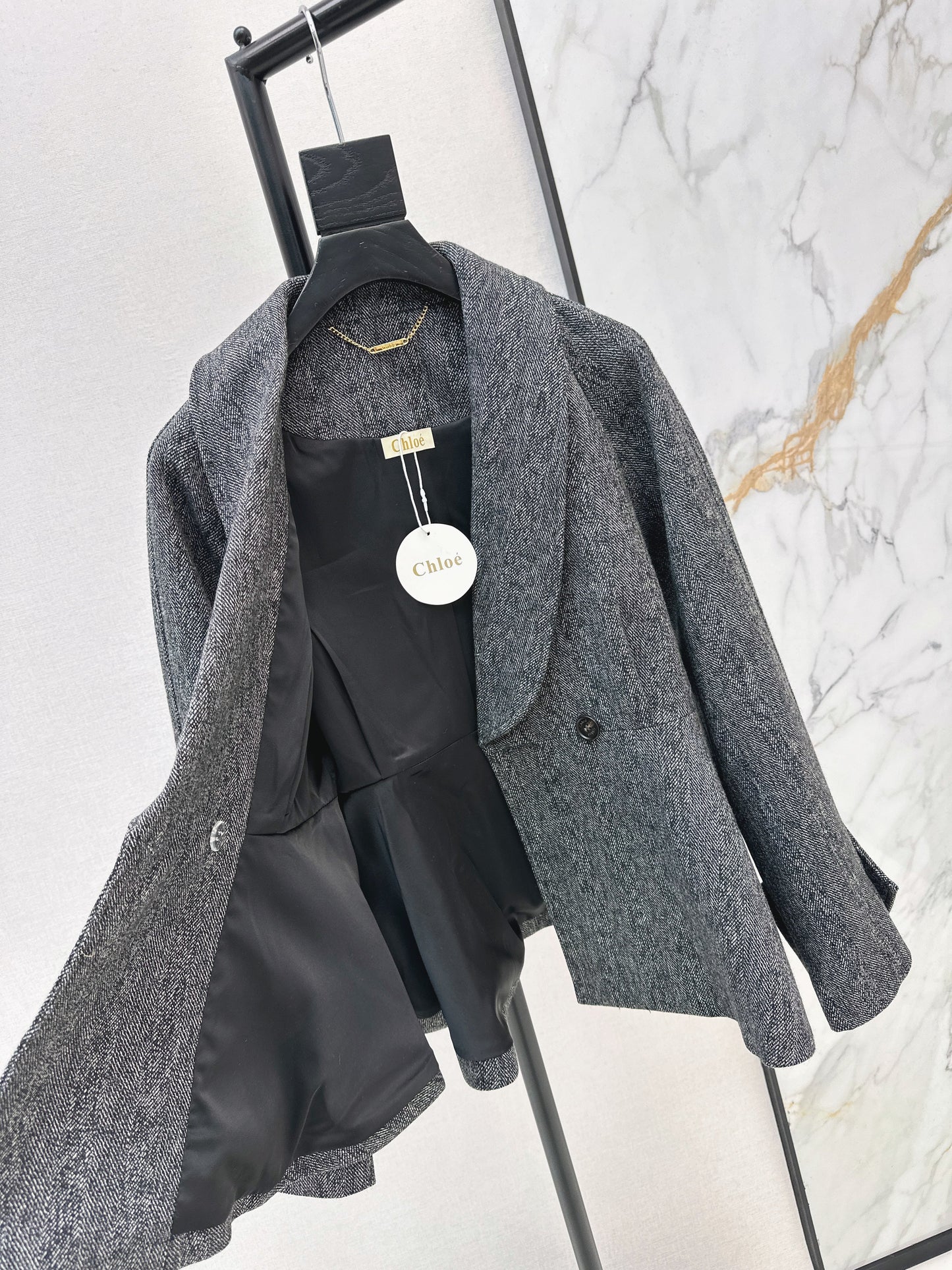 Chol NEW ruffle-hem belted jacket